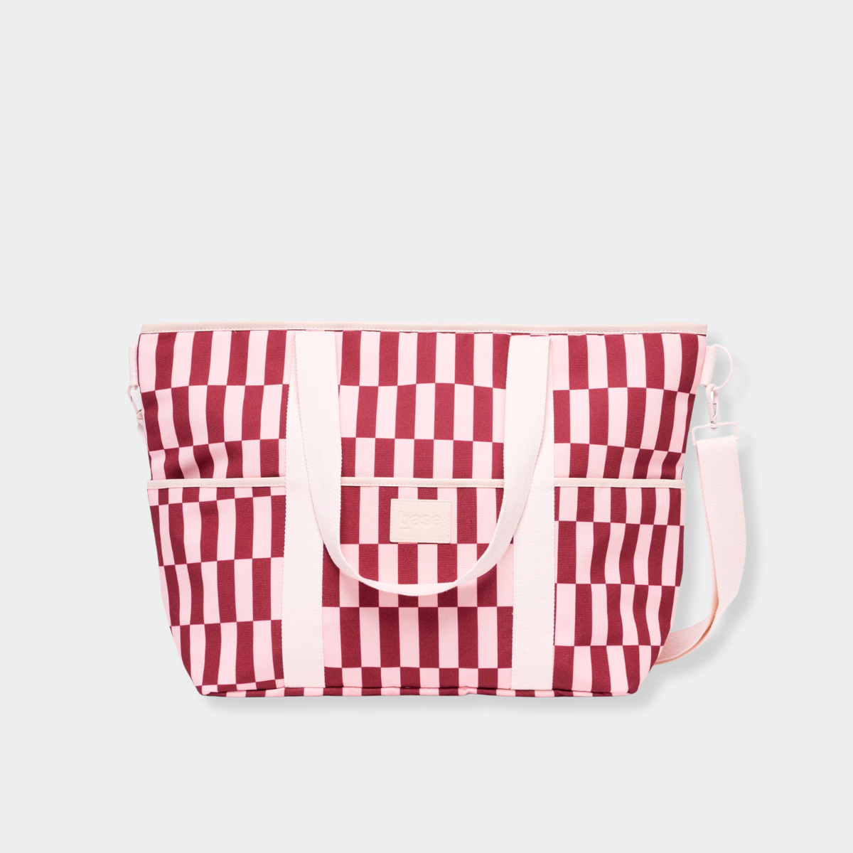 Burgundy and peony check insulated cooler base tote with adjustable strap and multiple pockets.