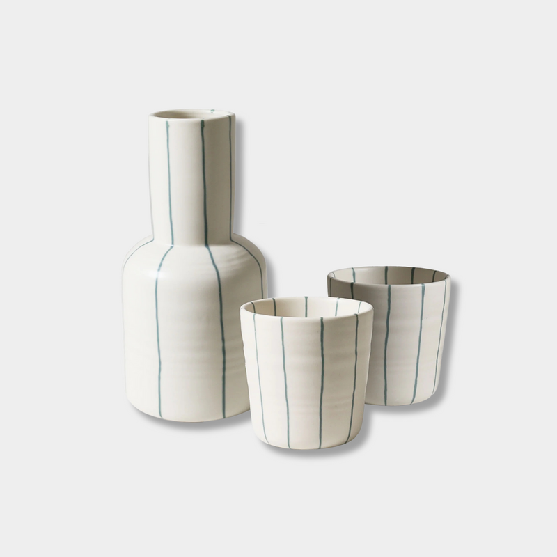 Robert Gordon Coastal Junction cream stoneware carafe set with green stripes, including one carafe and two cups.