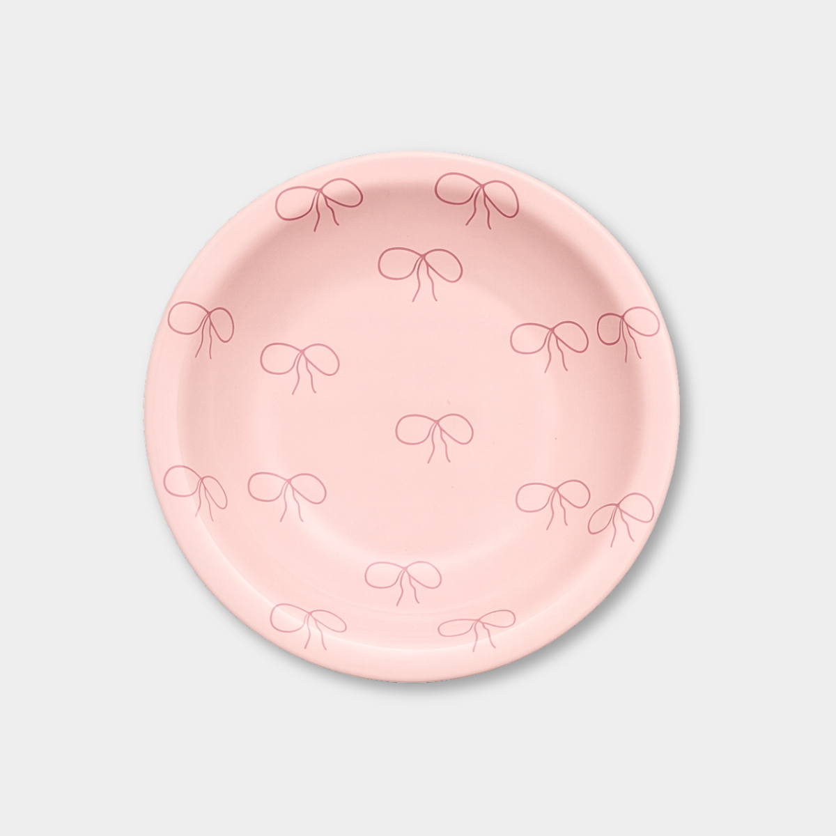 norsu Studio Bow Bowl small pink ceramic bowl with deep pink bow pattern and glossy finish