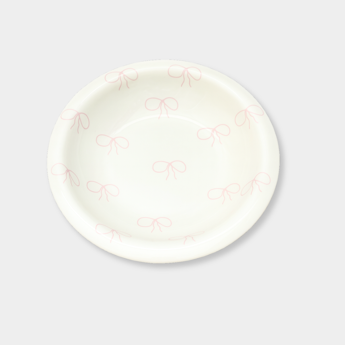 norsu Studio small white bowl with pink bow design and gloss finish