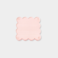 Set of four translucent ochre norsu Studio Perspex scallop coasters with signature scalloped edges