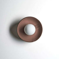 norsu x Robert Gordon Dish Wall Sconce in dusty rose ceramic with white globe light
