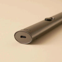 Gunmetal rechargeable lighter with USB-C port for eco-friendly ignition of candles, paper, and gas stovetops.