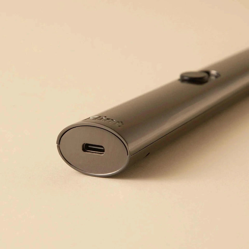 Gunmetal rechargeable lighter with USB-C port for eco-friendly ignition of candles, paper, and gas stovetops.