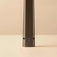 Gunmetal rechargeable lighter with LED battery indicator and sleek zinc alloy body.