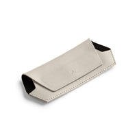 Slimline stone leather Fox and Leo glasses case, side view.