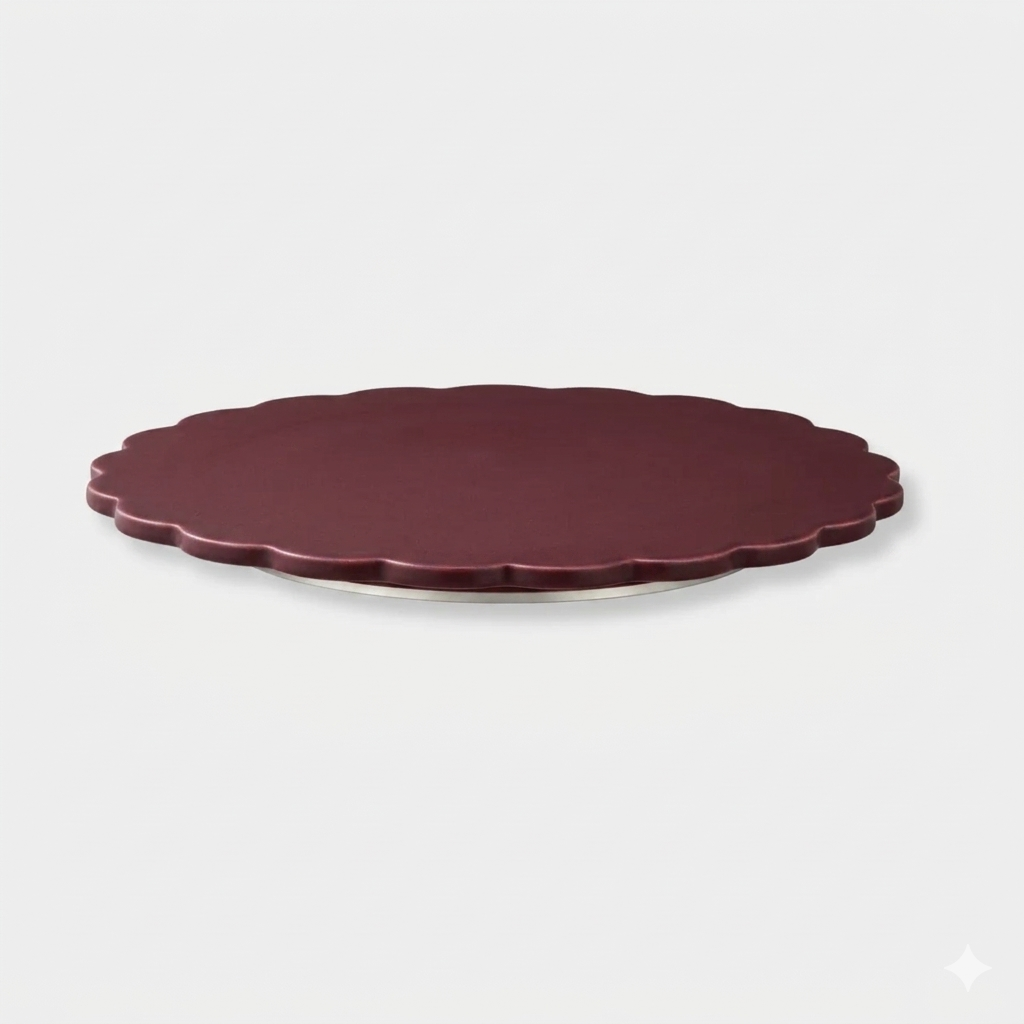 norsu Studio Spin Me Round Lazy Susan in merlot burgundy acrylic with scalloped edge and rotating base available in two sizes