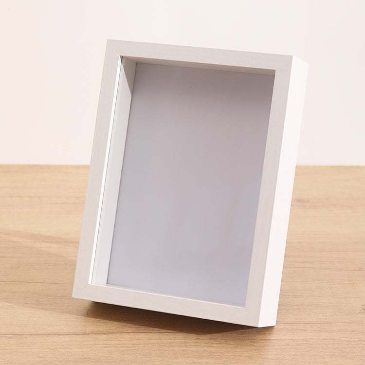 White norsu STUDIO Shadow Box A4 Frame with 3 cm depth, MDF construction, and clear perspex front, suitable for portrait or landscape display.