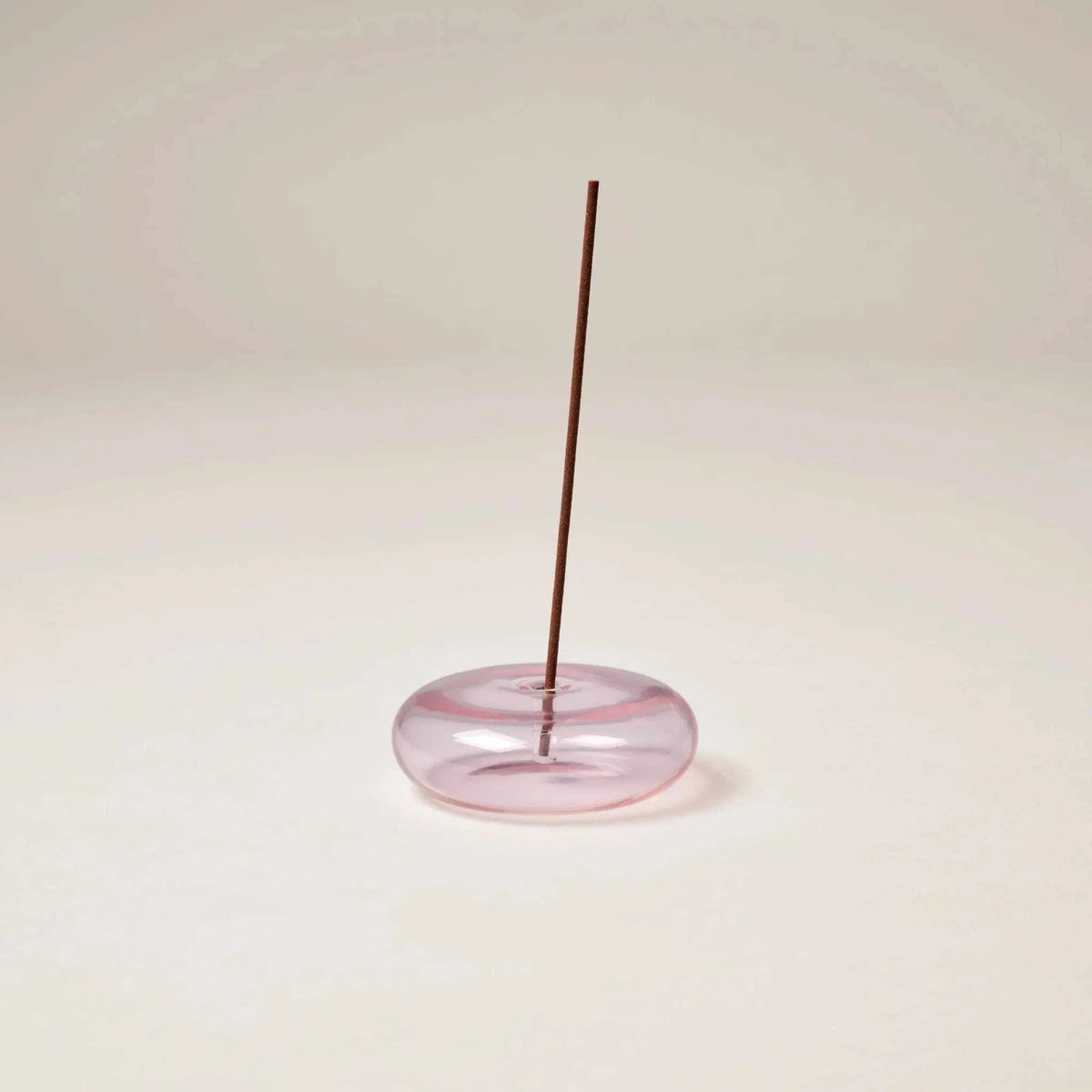 Pink Gentle Habits hand blown glass vessel incense holder with slender incense stick