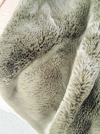 Pelage Faux Fur Throw in seafoam color with dense, soft 30mm pile and faux suede backing