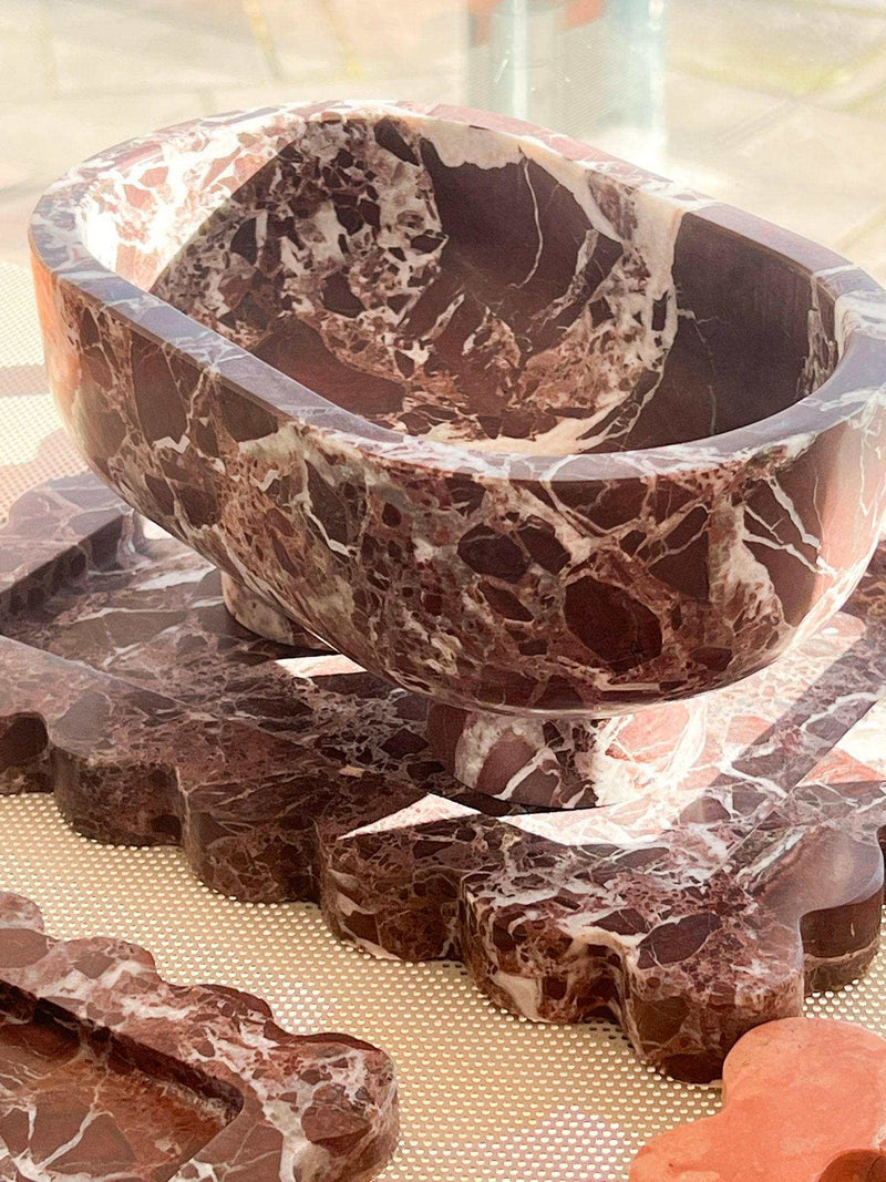 CoTheory Marble Footed Rosso Levanto oval tray with sculptural stone design and footed base
