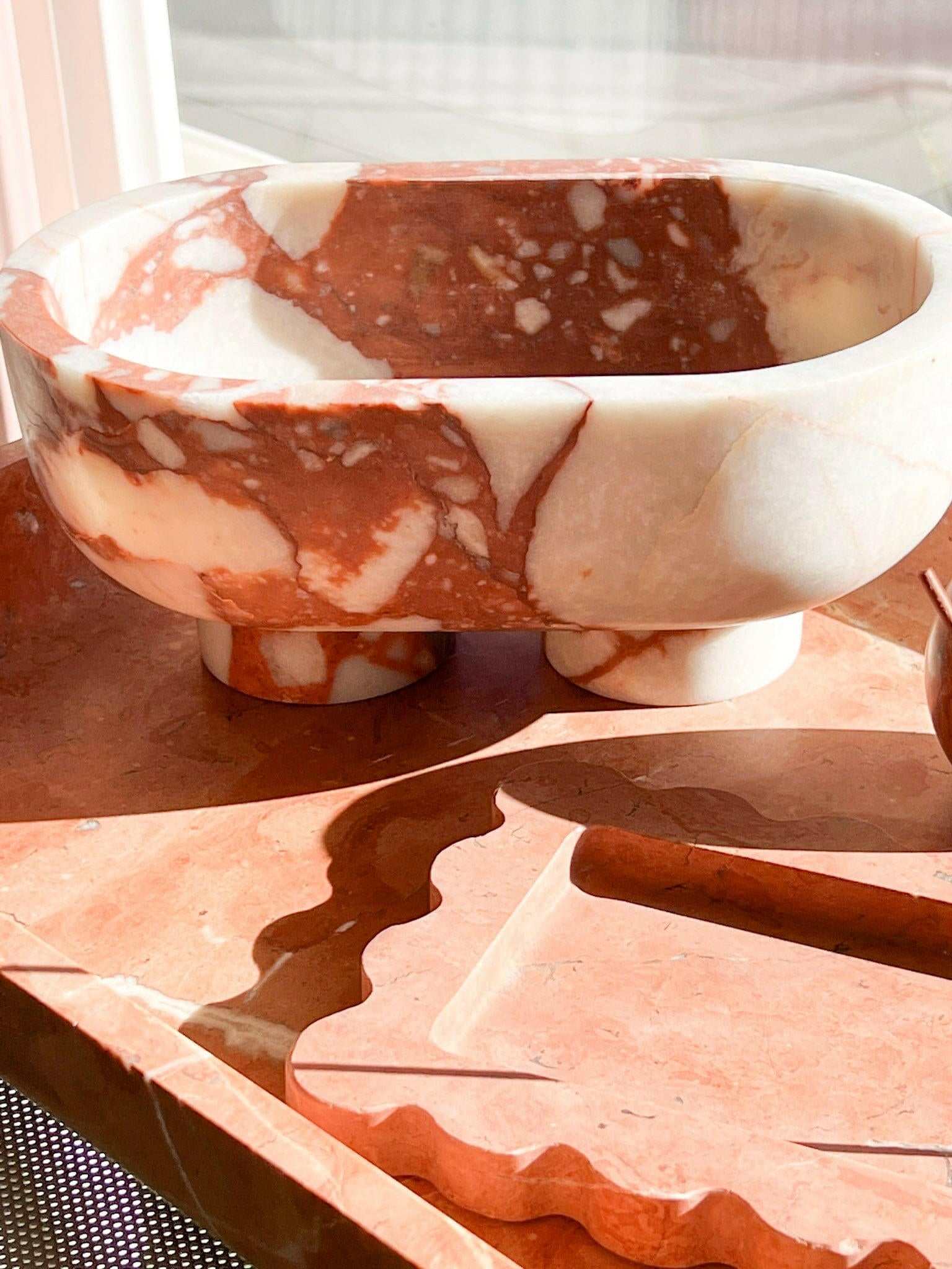 CoTheory Marble Footed Oval Tray in Brown Calacatta with unique natural stone patterns and sculptural design