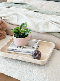 CoTheory Orbit Table Sculpture Rosso Levanto marble sphere on wooden tray with plant and books