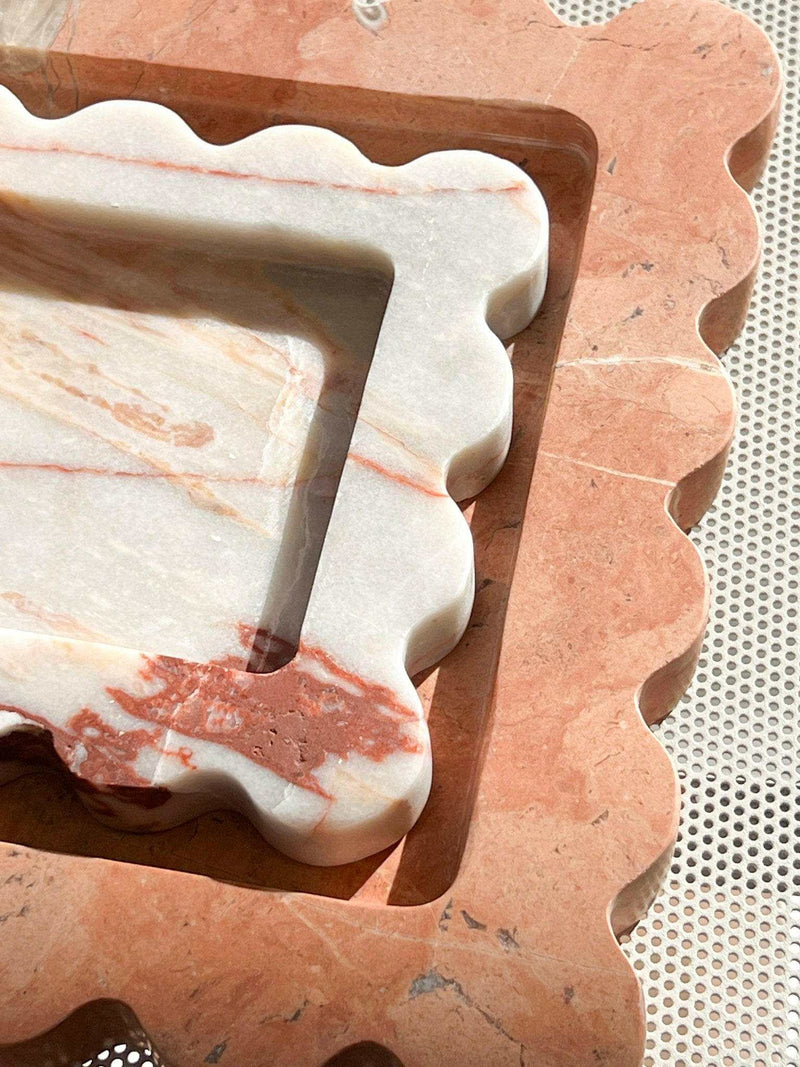 Close-up of CoTheory Marble Tray with small scalloped design in brown calacatta marble, featuring natural stone patterns and smooth finish