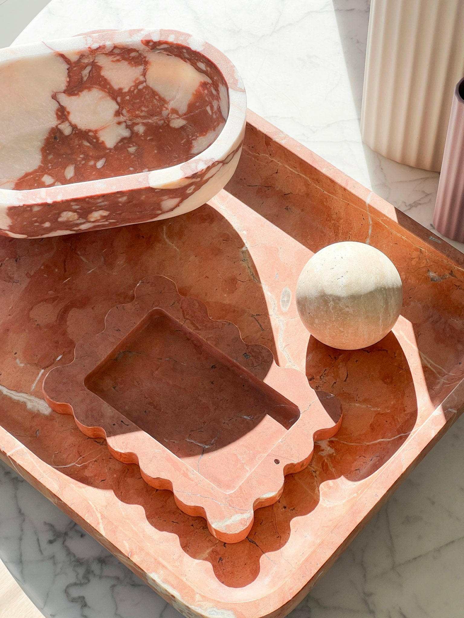 CoTheory Marble Footed Oval Tray in Brown Calacatta with sculptural design and polished stone finish