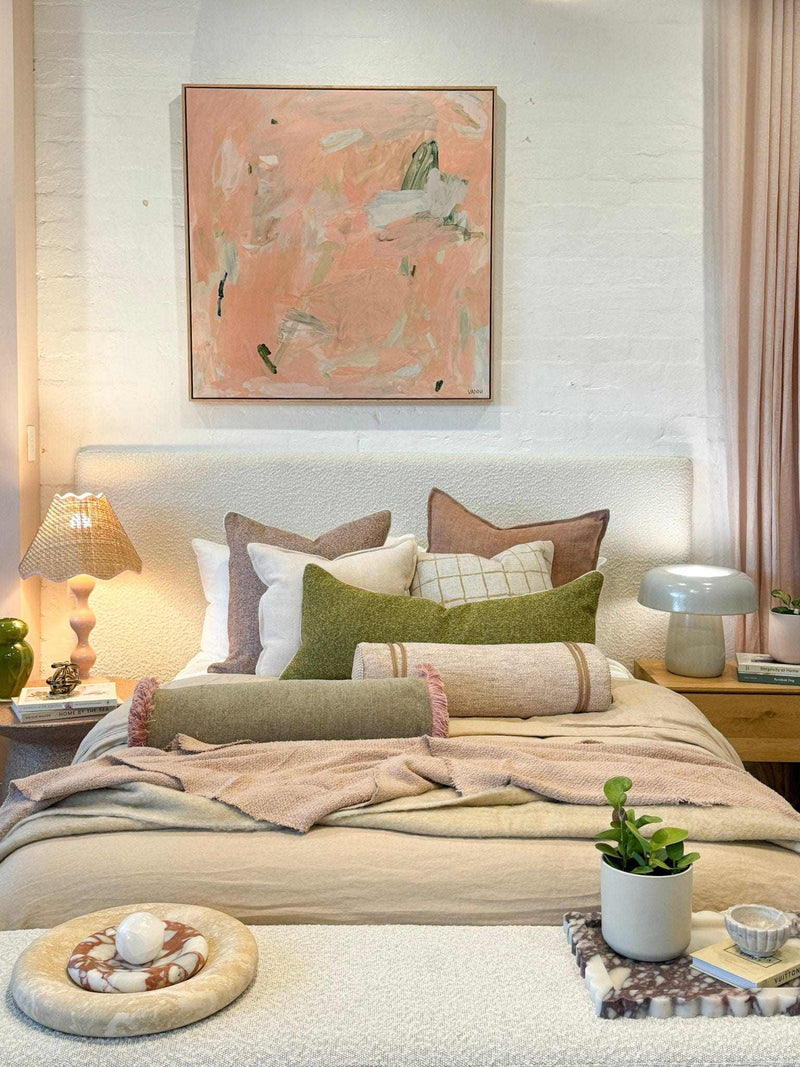 Oak framed Vanni Limited Edition fine art canvas print "Under a Safe Sky" 100x100cm displayed above a cozy bed in a stylish bedroom setting