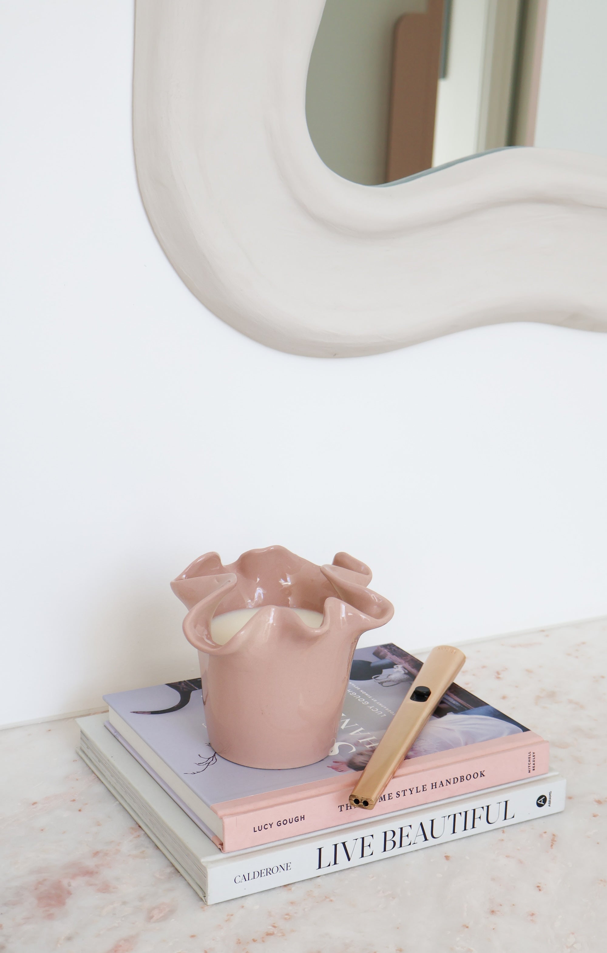 norsu Studio Flow blush ceramic two-in-one candle vessel with Alhambra scent and ruffled edge design