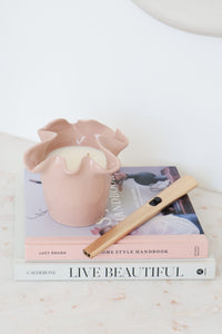 norsu Studio Flow blush ceramic two-in-one candle and vessel with ruffled edge and Alhambra scent
