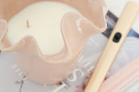 norsu Studio Flow blush sculptural ceramic candle with Alhambra scent and ruffled edge vessel