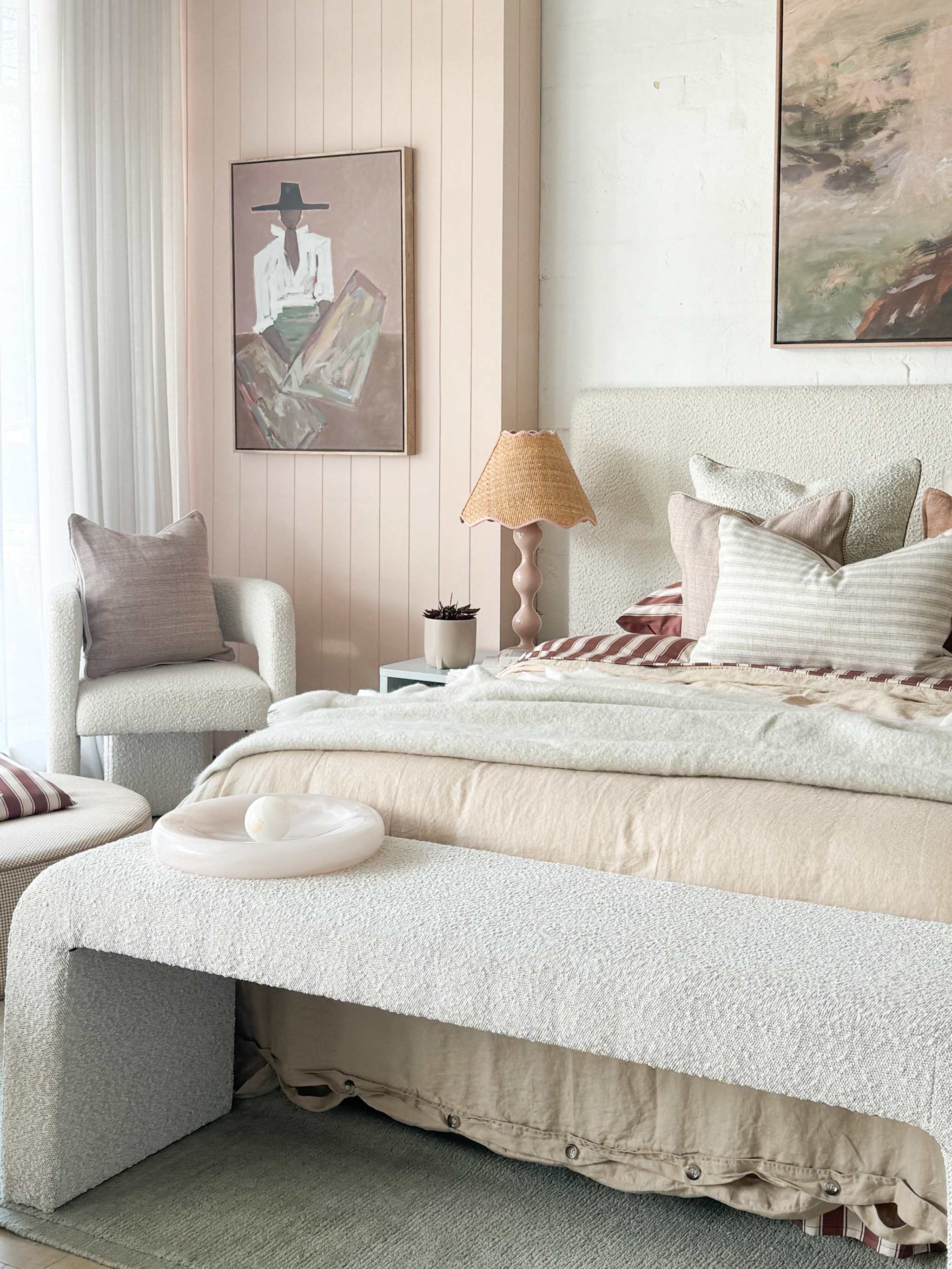 Oak framed Marcia Priestley 'Chaps Rosata' canvas print in a cozy beige bedroom setting