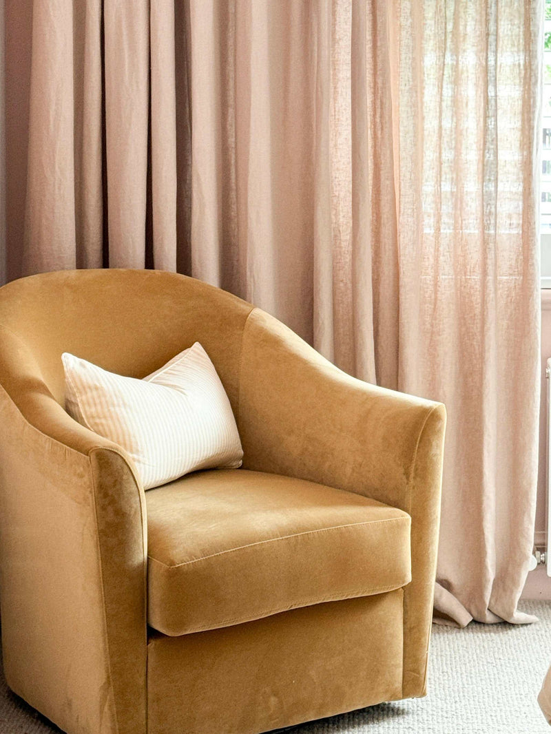 norsuHOME swivel chair in caramel velvet with feather cushion and playful swivel base