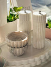 Lorne Salt + Pepper Mill solid white marble grinder with fluted design on a kitchen tray