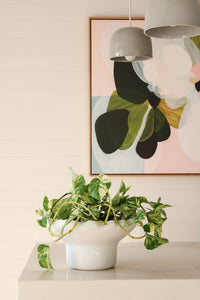 norsu Studio Flow white sculptural ceramic pedestal fruit bowl with ruffled edge and blush glaze