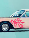 Greg Mount fine art print featuring a vintage car with red graffiti on the door against a clear blue background