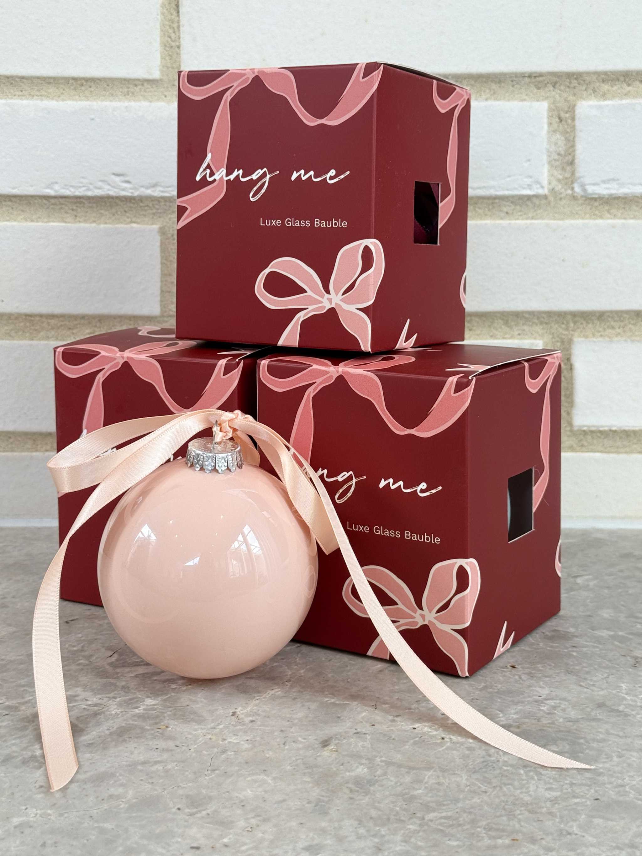 norsu STUDIO glass Christmas bauble burgundy color with blue satin ribbon in boxed packaging