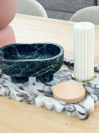 CoTheory Marble Footed Oval Tray in Verdi Alpi with sculptural design and felt pads on marble surface