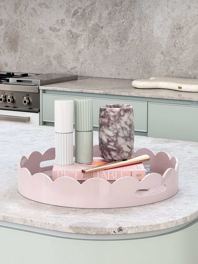 norsu Studio Salt & Pepper Grinders in sage green with rubber wood body and gloss finish on kitchen countertop