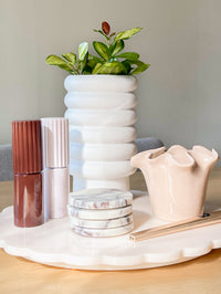 norsu Studio Spin Me Round Blush acrylic lazy Susan with scalloped edge and smooth rotating base in two sizes