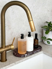 norsu STUDIO Duality Collection Oval Tray in Rosso Levanto marble with burgundy veining and polished finish