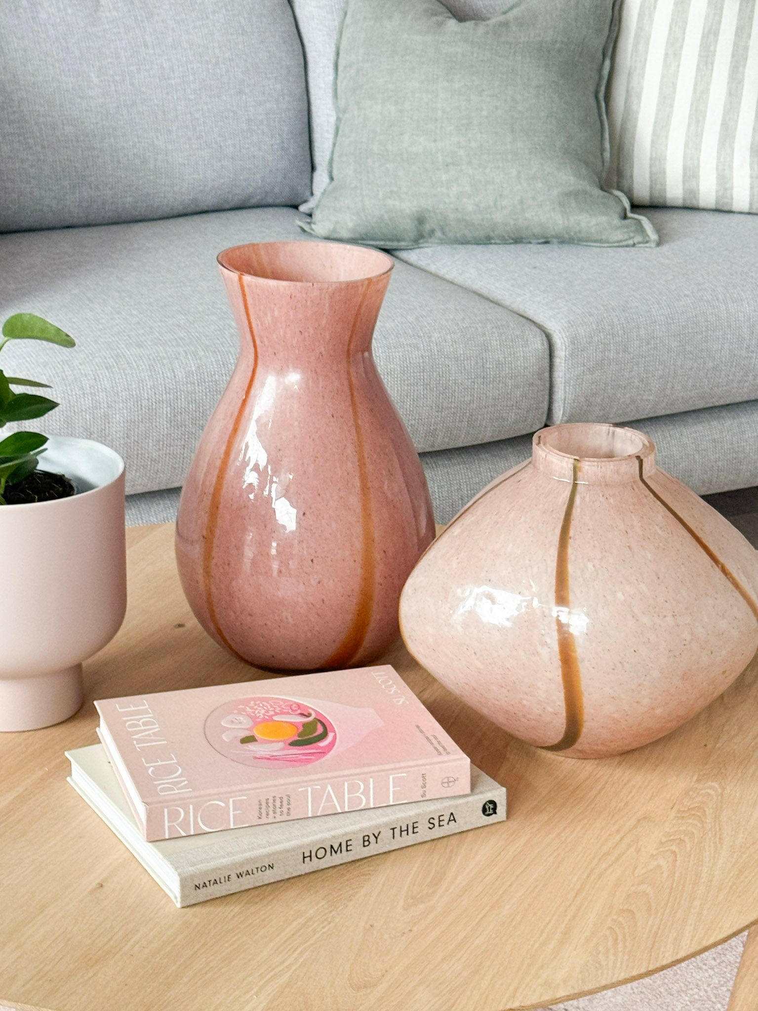 GlobeWest Boden Stripe Wide Vase in blush handblown glass with delicate stripe pattern on coffee table