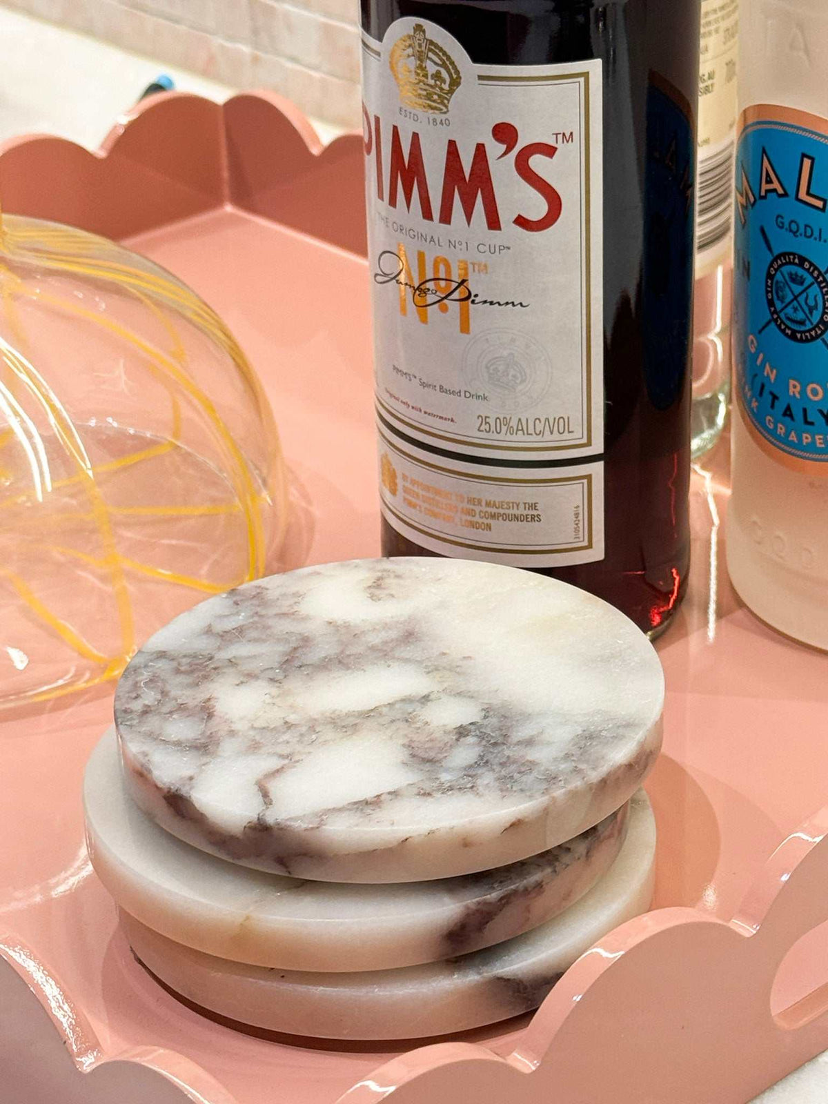 Set of two norsu Studio Viola marble coasters with distinctive purple veining and polished finish