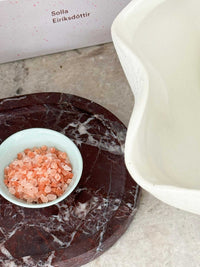 norsu STUDIO Rosso Levanto round marble tray with deep burgundy veining from Duality Collection