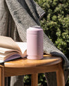 Mauve Beysis Drinks Cooler stainless steel can cooler with built-in bottle opener on wooden table outdoors