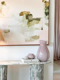 GlobeWest Boden Stripe large lilac handblown glass vase on marble table with decorative items and abstract wall art