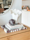 White Megan Decorative Vase 27cm with organic sculptural shape on books and marble tray on wooden table