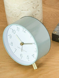 Maisie Silent Tick Alarm Clock in green with gold accents and retro design features alarm and nightlight functions