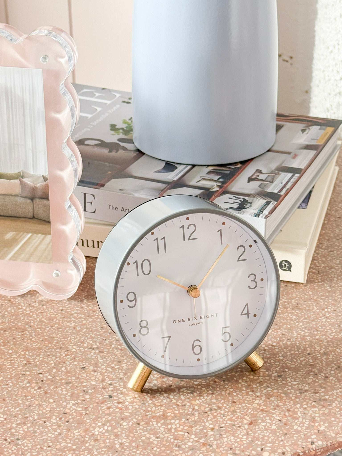 Maisie Silent Tick Alarm Clock in grey with gold accents, vintage design, and silent ticking.