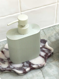 Seafoam Rosie resin dispenser with ridged grip for kitchen or bathroom use