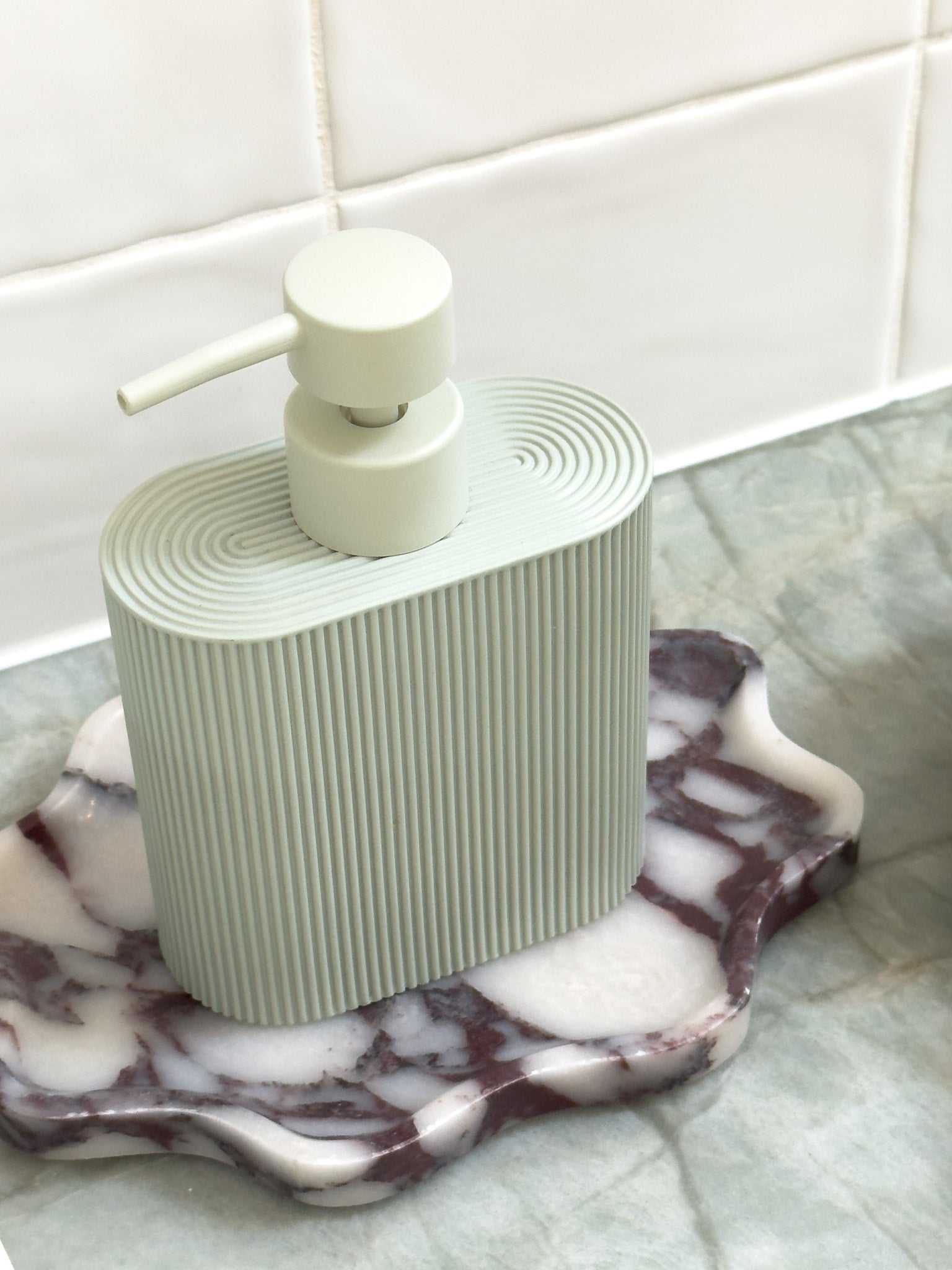 Seafoam Rosie resin dispenser with ridged grip for kitchen or bathroom use