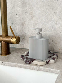 Grey Rosie Resin Dispenser with ridged grip, made of durable resin for kitchen or bathroom use