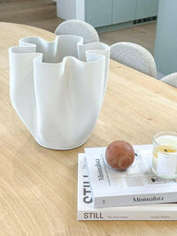 Bailey Decorative Vase matte ceramic with unique wavy design on wooden table