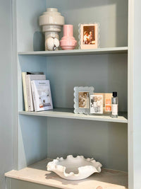 Nicole Decorative Bowl white ceramic with ruffled edges, 30cm diameter, styled on shelf