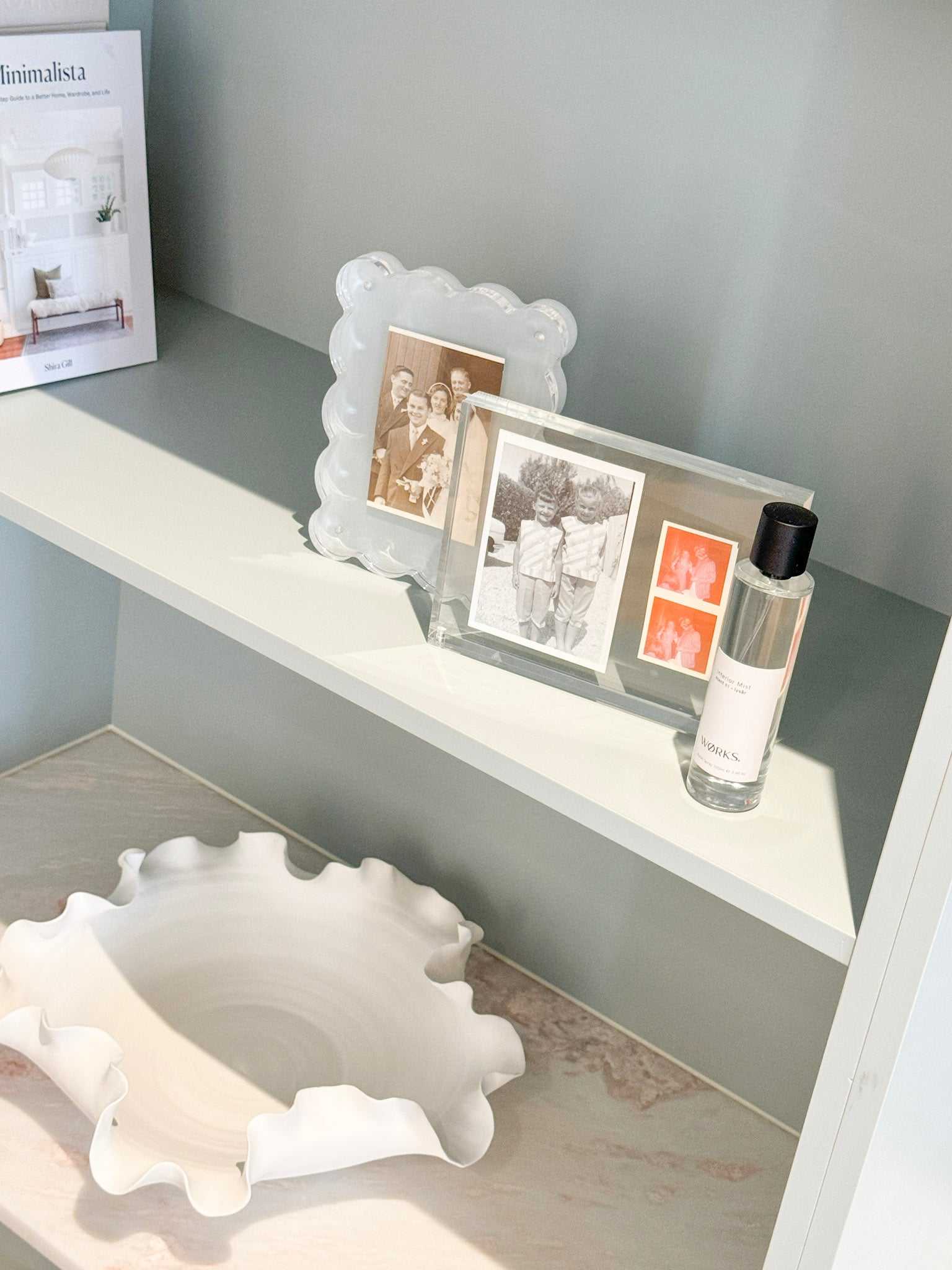 Nicole Decorative Bowl white ceramic with ruffled edges on shelf