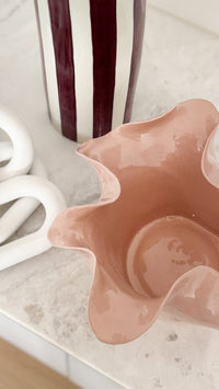 norsu Studio Flow sculptural ceramic bowl in muted blush with ruffled edges and glossy finish