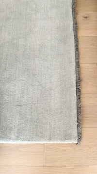 Baya Sandringham Floor Rug in powder blue handknotted 100% wool with delicate fringe exclusively from Norsu