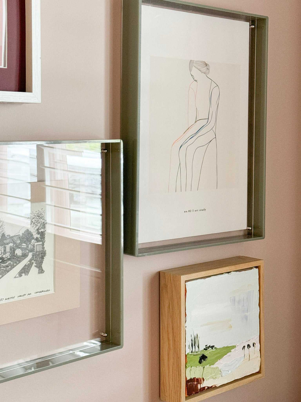 Minimalist line art "In This Moment Print" digital downloadable wall art in modern frame displayed on beige wall.